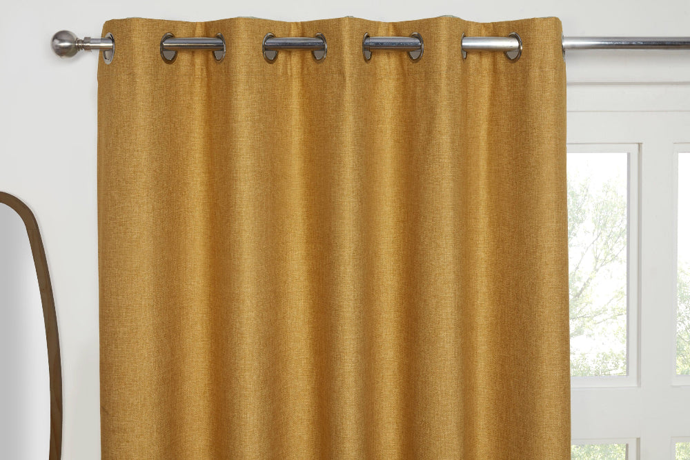 Cosmos Blackout Eyelet Curtains available in four colours